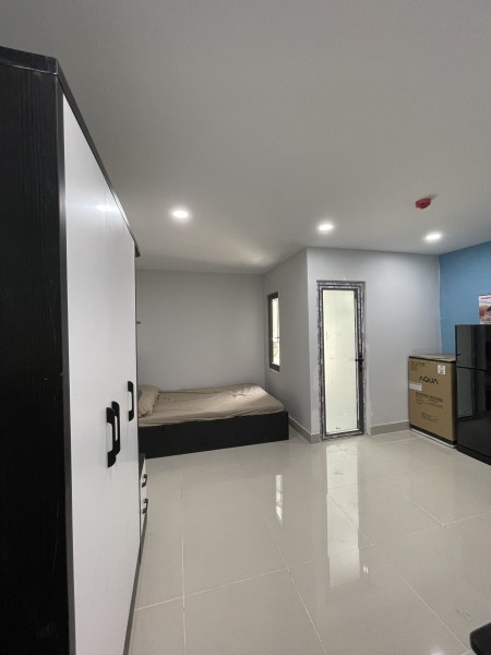 Cho thuê phòng Quận 7 dạng studio, máy giặt riêng, balcon, gần Lotte, 30m2